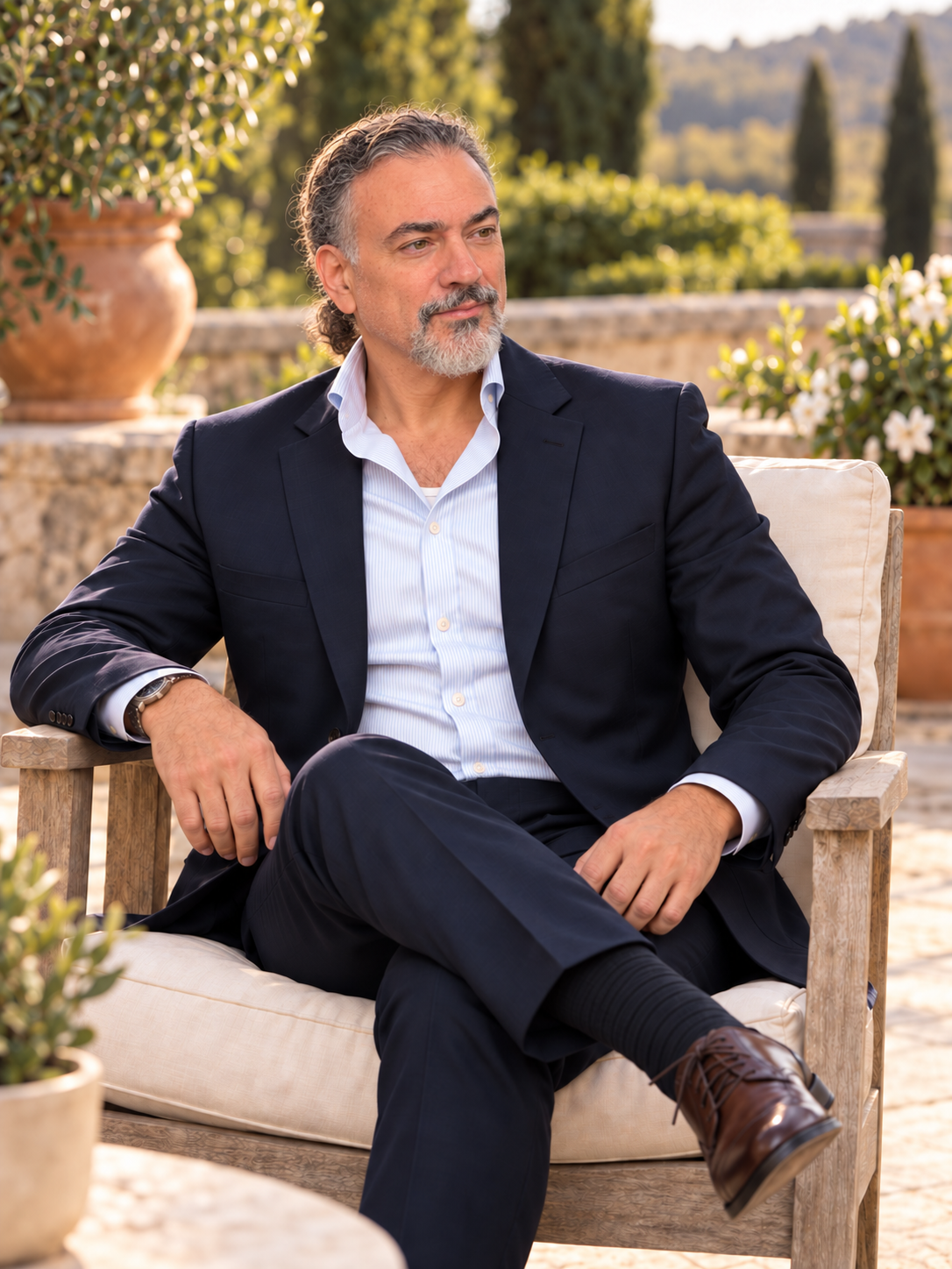 Portrait of author L.T. Ryan on an outdoor terrace